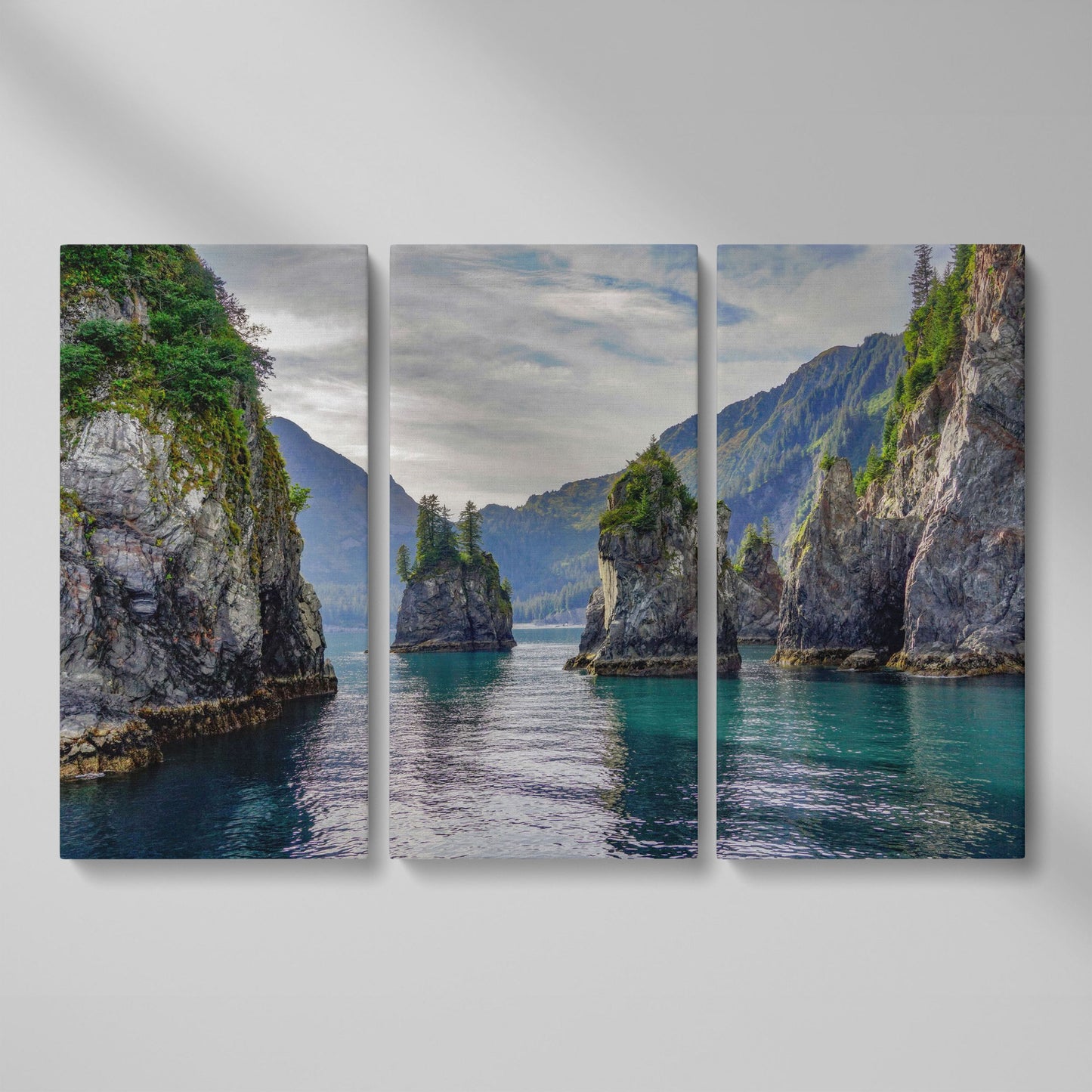 Turquoise Water and Rock Spires Panoramic Canvas as 3-panel split version