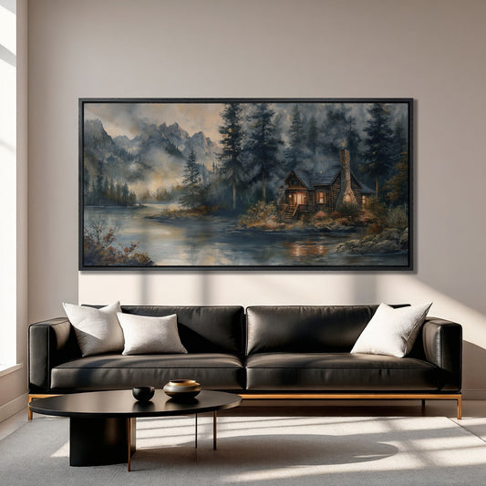 Rustic Riverside Cabin Canvas Print with Misty Mountains