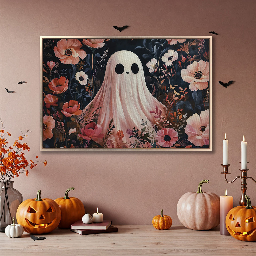 Framed Wall Art: Whimsical ghost print with floral details, warm pink and dark teal color palette, perfect for Halloween decor.