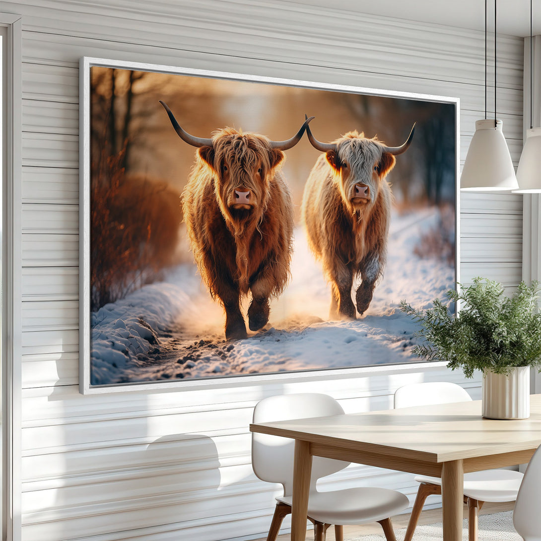 Framed Wall Art featuring Highland cows in a snowy landscape. Warm, inviting color palette. Perfect for rustic decor. Bring the outdoors in!
