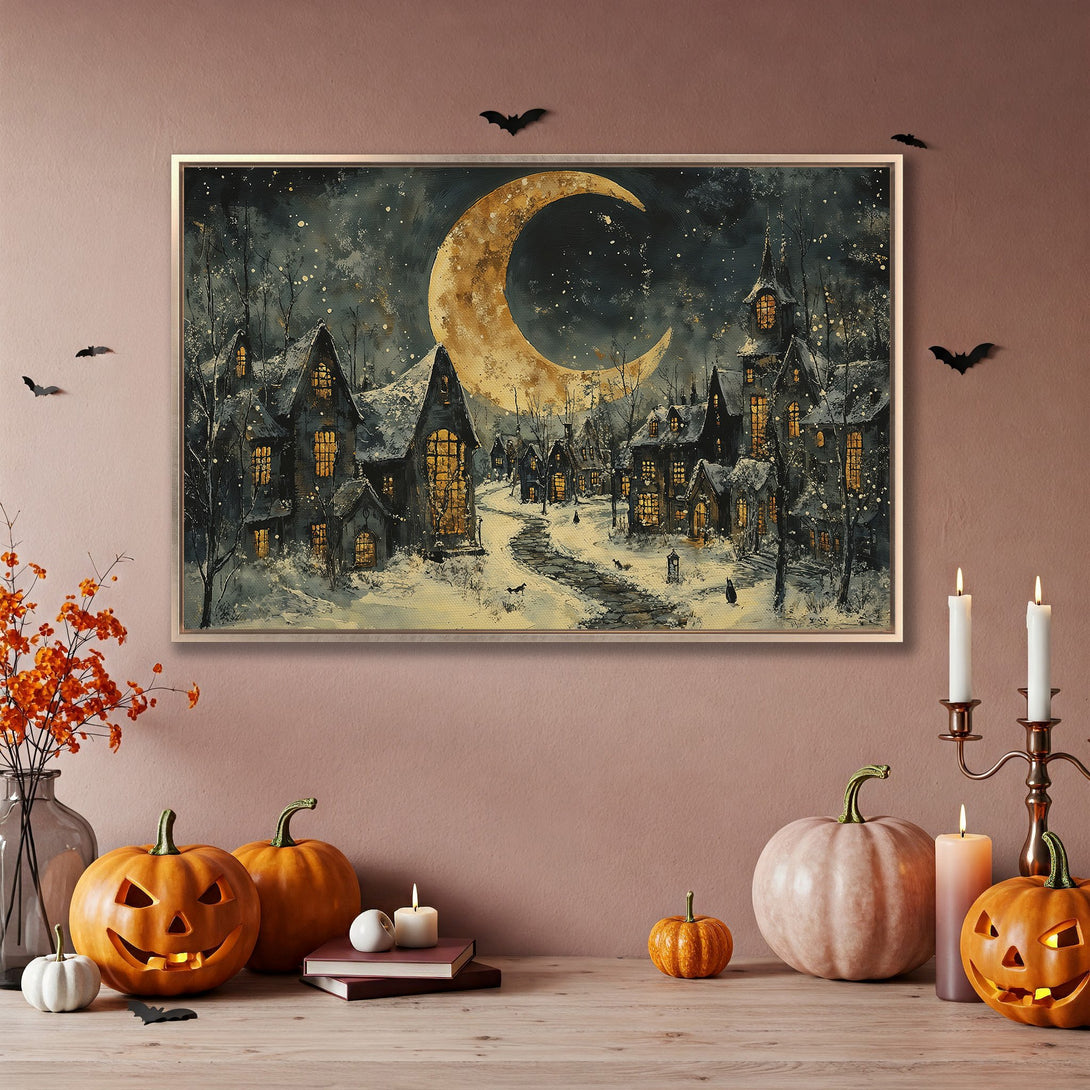 Framed Wall Art: Spooky Halloween village scene with a crescent moon, in a dark, moody color palette. Perfect for fall decor!