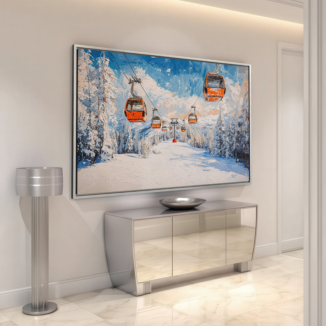 Framed Wall Art: Winter ski resort scene in blue, white, and orange. Modern canvas print adds a touch of alpine charm to any interior decor.