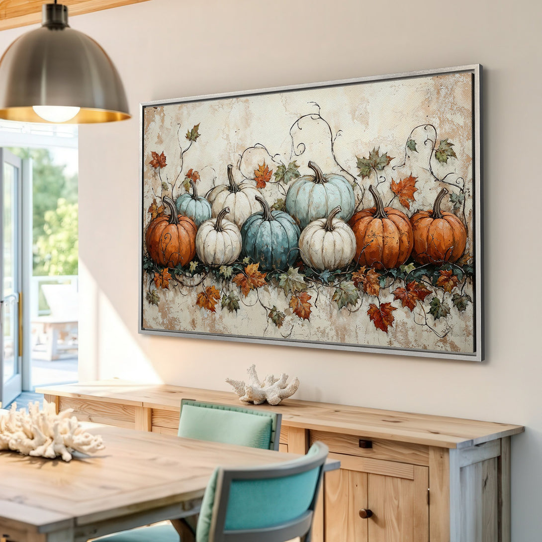 Framed Wall Art featuring a rustic pumpkin painting in warm autumn colors. Perfect fall decor to add cozy charm to your home.