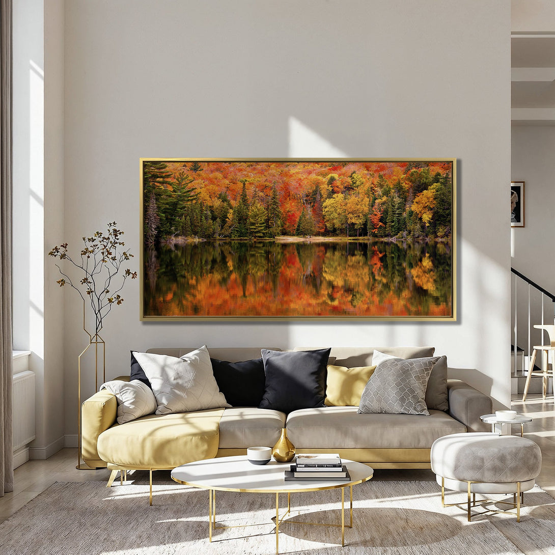 Canvas Print of a vibrant autumn lake scene, featuring fiery orange and yellow foliage reflected in the water. Perfect wall art for a cozy living room.