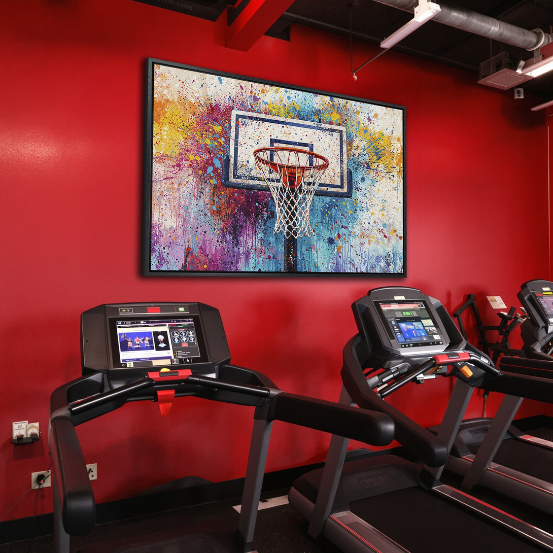 Framed Wall Art featuring a vibrant, abstract basketball hoop painting. Colorful splatter art style with a red, blue, and yellow palette. Perfect for gym decor!
