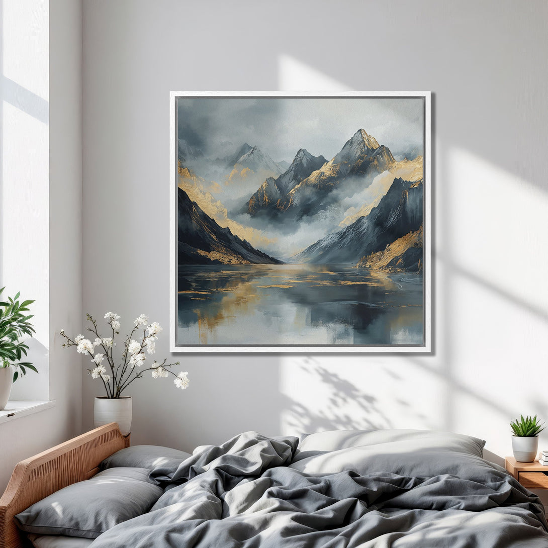 Framed Wall Art featuring a serene mountain landscape in muted blues, grays, and gold. Perfect for adding a touch of nature to your bedroom decor.