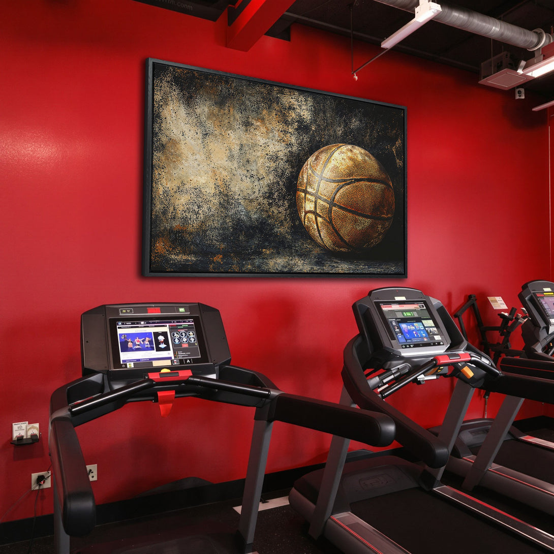 Framed Wall Art: Abstract basketball art in a gym. Earthy tones pop against the red wall. Perfect decor for sports enthusiasts!