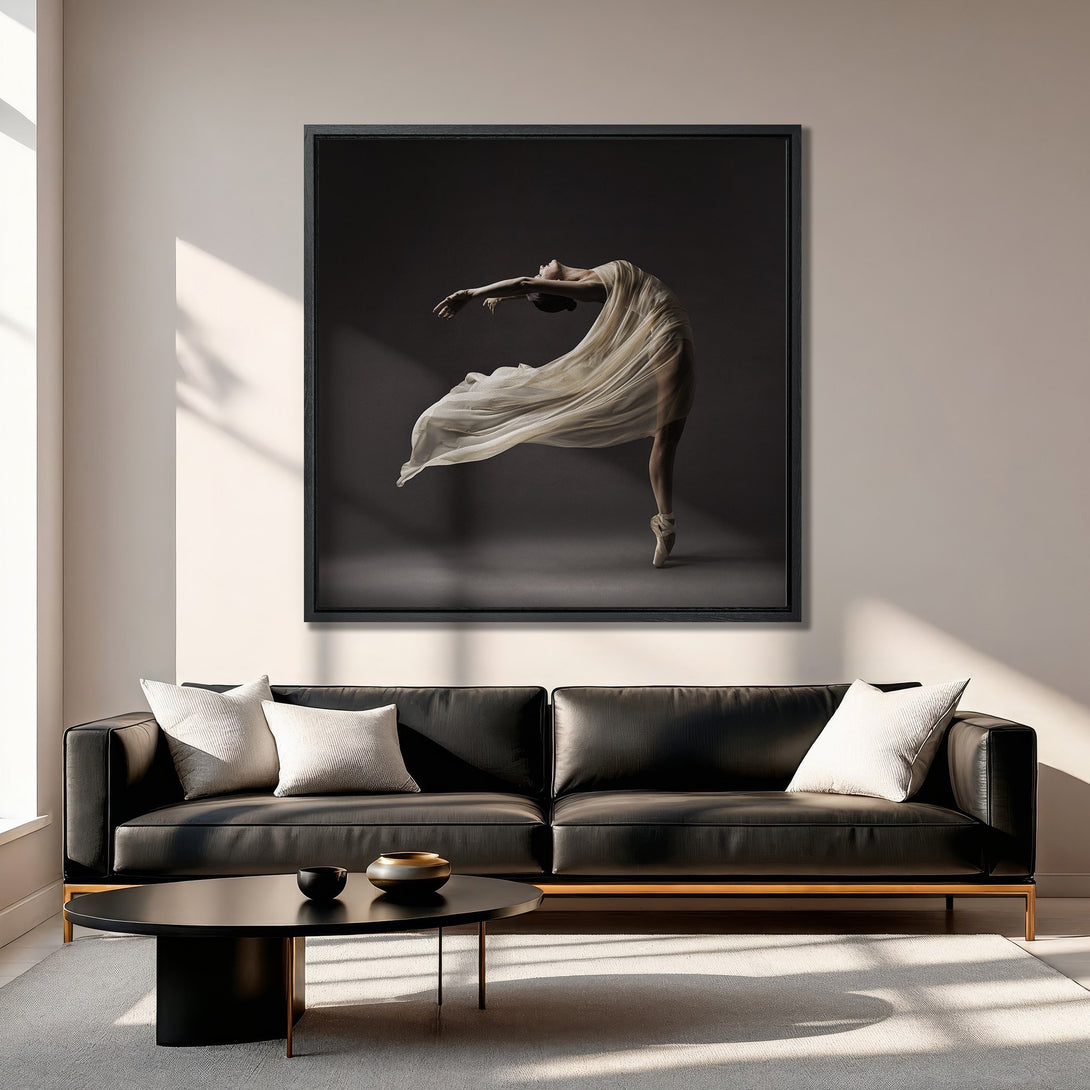 Framed Wall Art of a ballerina in flowing fabric. Elegant, minimalist style with a neutral, monochromatic color palette. Perfect for modern home decor.