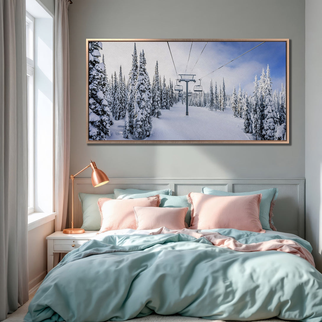 Framed Wall Art of a snowy ski slope scene in a bedroom. Featuring a winter landscape with a blue and white color palette, perfect for cozy decor.