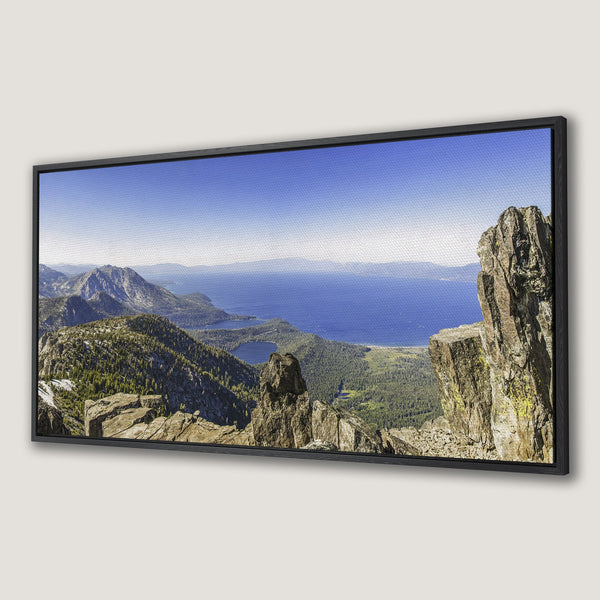 Framed Wall Art: Stunning mountain and lake landscape canvas print. Features blues, greens, and browns in a natural, scenic style. Perfect for home decor.