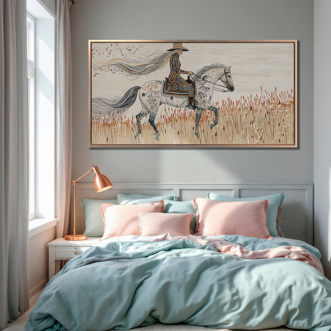 Framed Wall Art featuring a cowgirl on horseback, showcasing a neutral color palette with pops of blue and pink, perfect for bedroom decor.