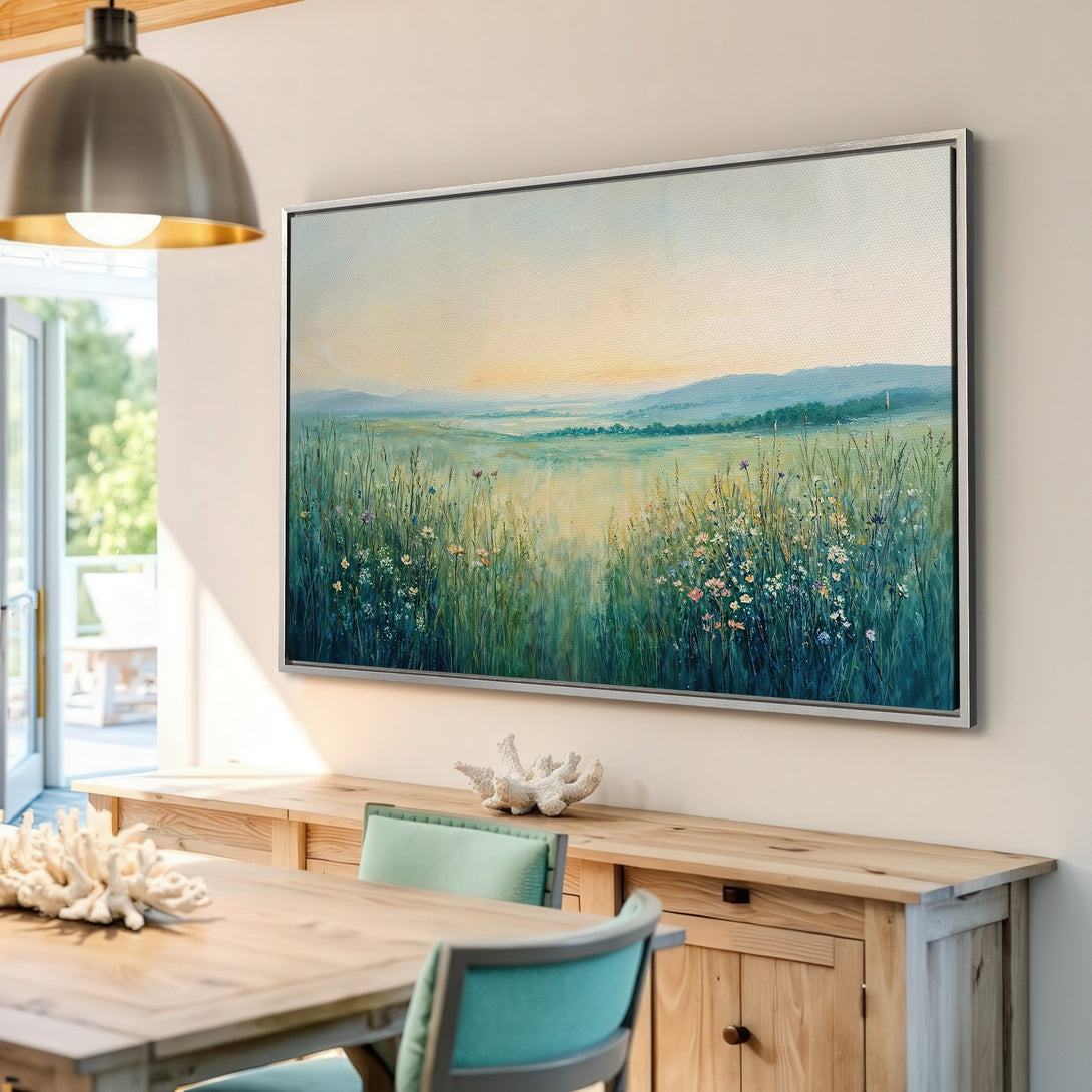 Framed Wall Art: Landscape Canvas Print with a serene meadow scene in a soft, blue, green, and yellow color palette. Perfect for adding a touch of nature.