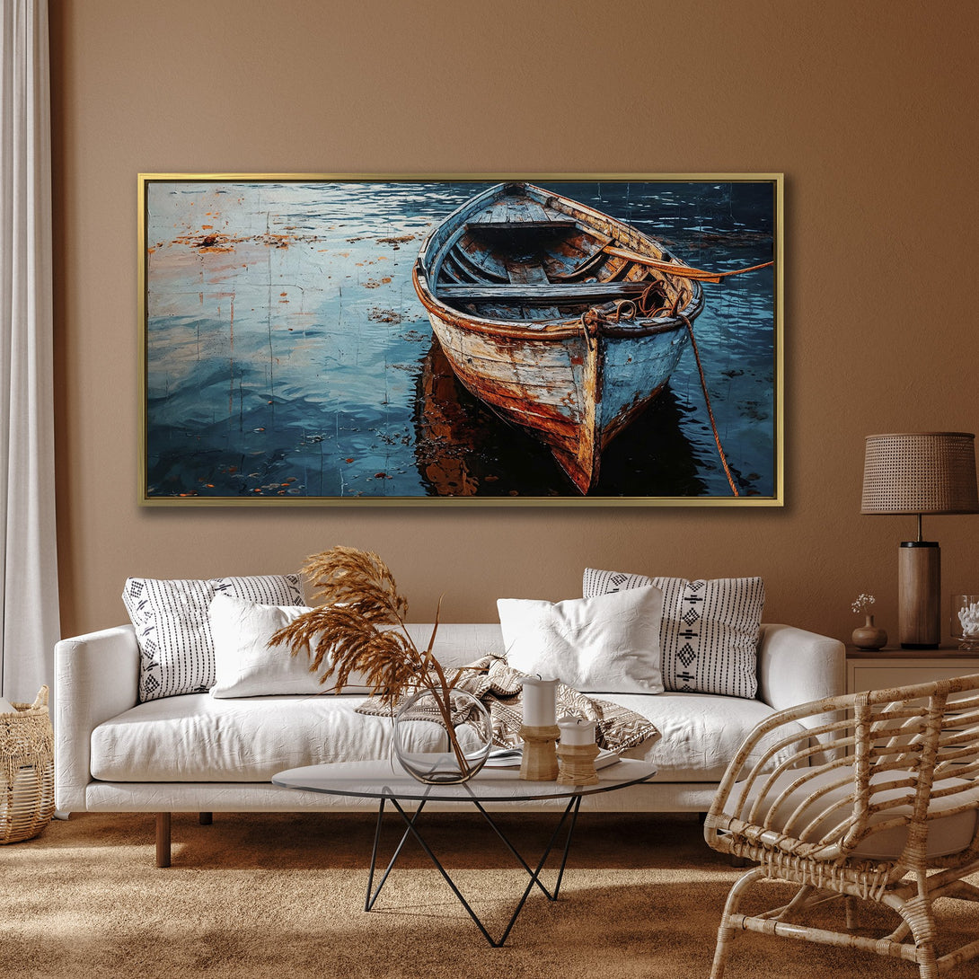 Canvas Print of a weathered boat on water, featuring a blue and orange color palette. Coastal art perfect for home decor.