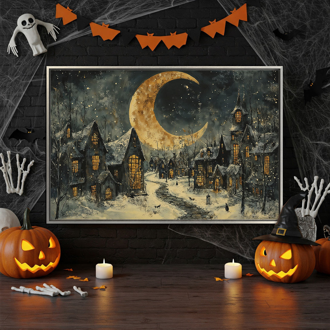 Framed Wall Art: Spooky Halloween village scene with a large moon, dark blues, and warm yellow hues. Perfect for seasonal decor!