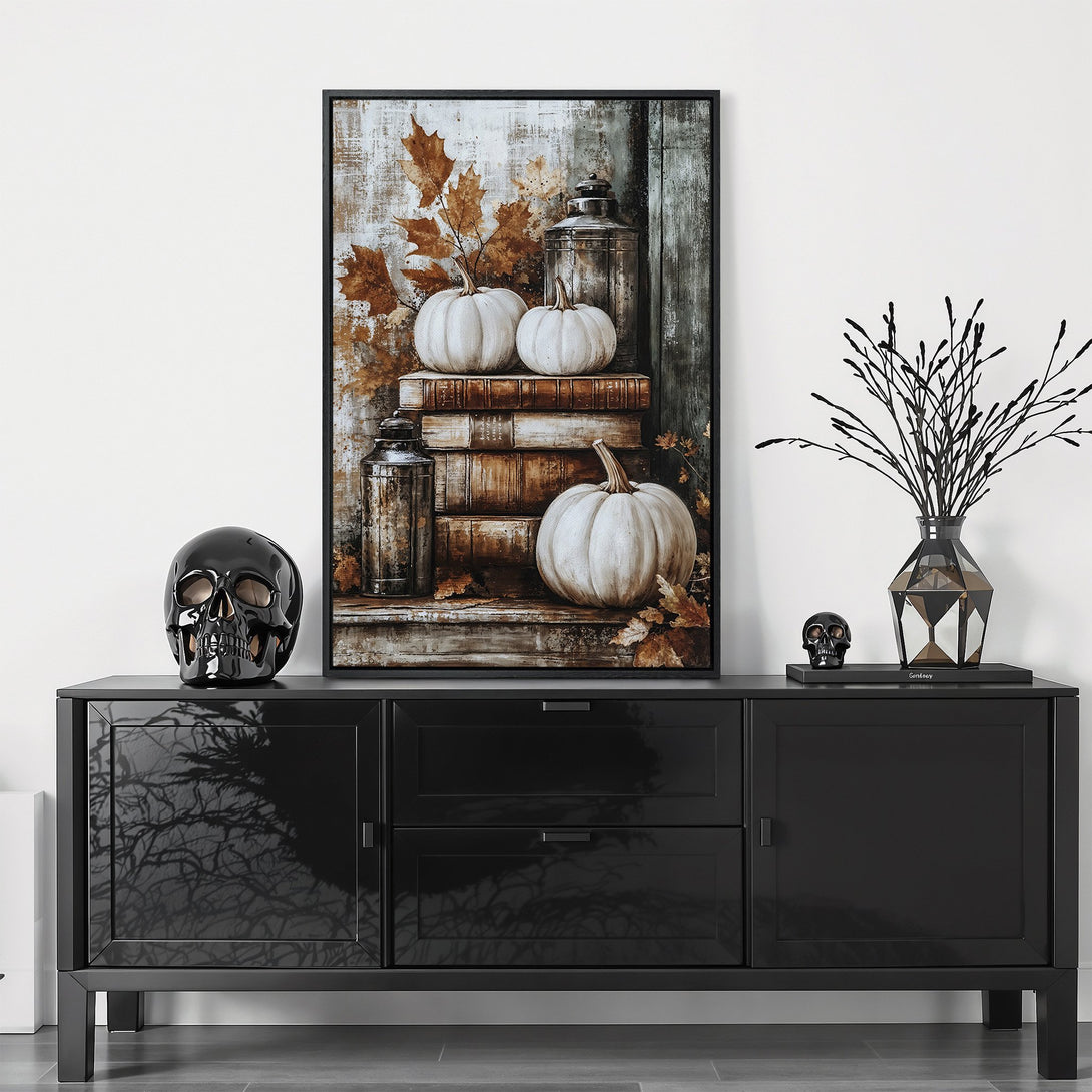 Framed Wall Art featuring pumpkins, leaves, and books in a rustic style. Warm, autumnal color palette perfect for fall decor.