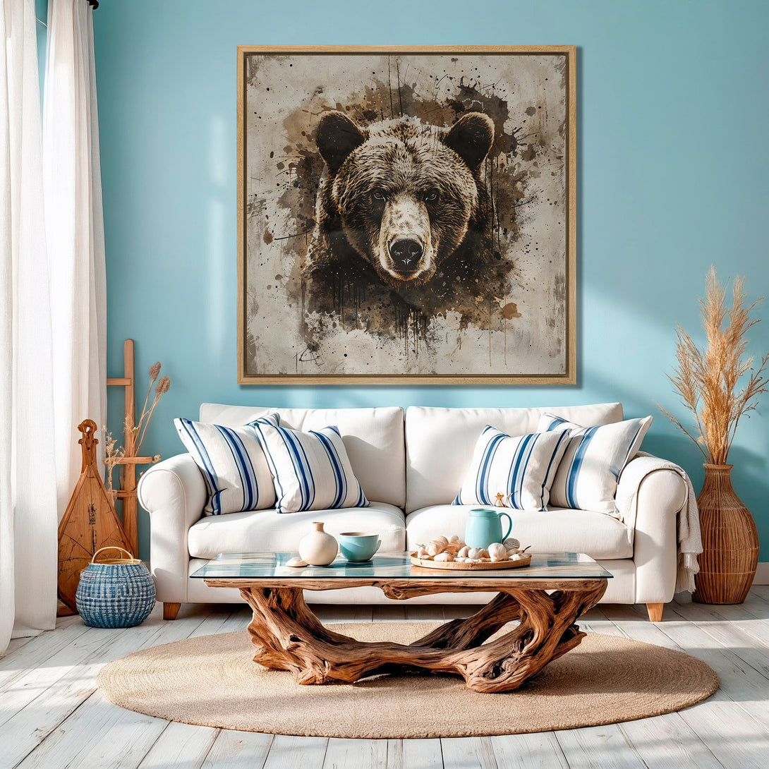 Framed Wall Art: Grizzly bear portrait in watercolor style, displayed in a modern living room. Earthy brown tones pop against a blue wall, creating a cozy aesthetic.