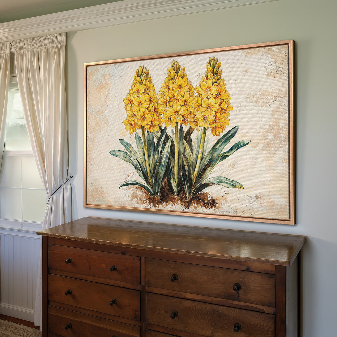 Framed Wall Art of yellow flowers in a watercolor style. Warm color palette with gold frame. Perfect for home decor.
