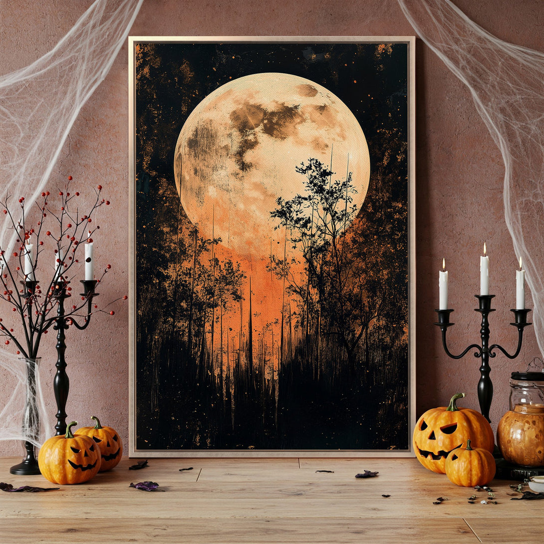 Framed Wall Art featuring a spooky moonlit forest scene. Orange, black, and gold color palette. Perfect Halloween decor for your home!