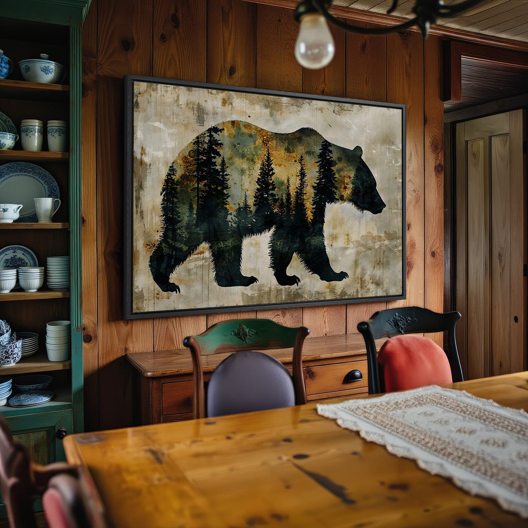 Framed Wall Art featuring a bear silhouette with forest detail in a rustic style. Earthy tones of green, brown, and beige. Perfect for cabin decor.
