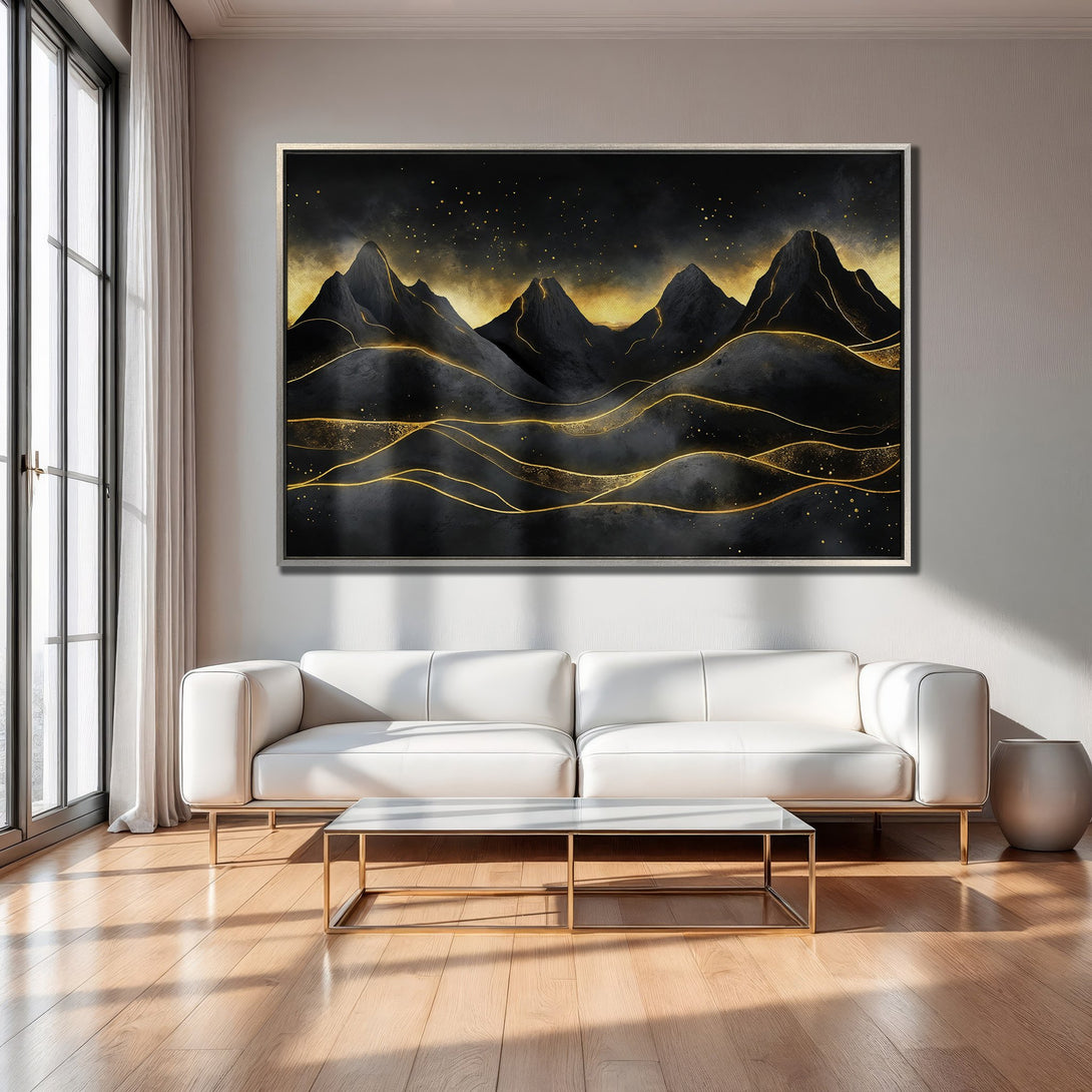 Framed Wall Art: Abstract mountain landscape canvas print in black and gold, modern style, displayed in a living room.