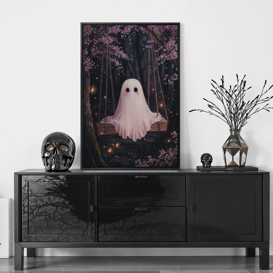 Framed Wall Art featuring a whimsical ghost on a swing in a magical forest. Soft pink and dark green color palette. Perfect for adding a touch of spooky charm.
