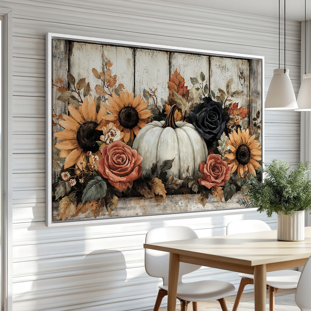 Framed Wall Art featuring a rustic floral arrangement with sunflowers, roses, and a pumpkin. Warm autumn color palette for cozy home decor.