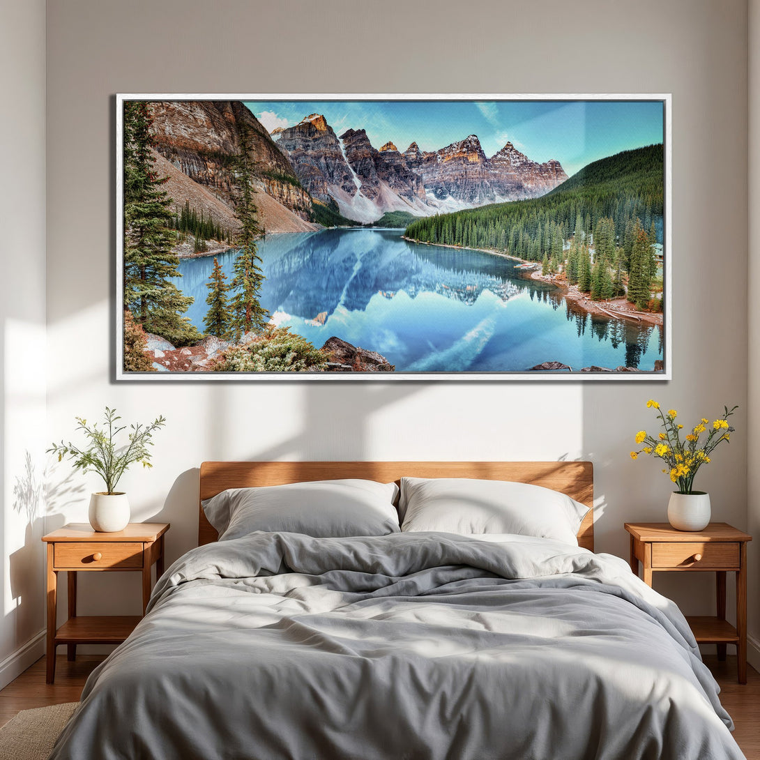 Framed Wall Art: Stunning mountain lake scene canvas print in a bedroom. Captivating blue, green, and brown color palette. Transform your space with nature's beauty.