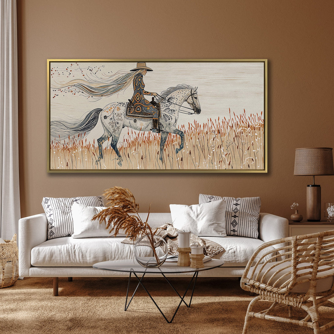 Canvas Print of a woman riding a horse in a field. Boho style art with neutral and earthy tones. Perfect wall decor.