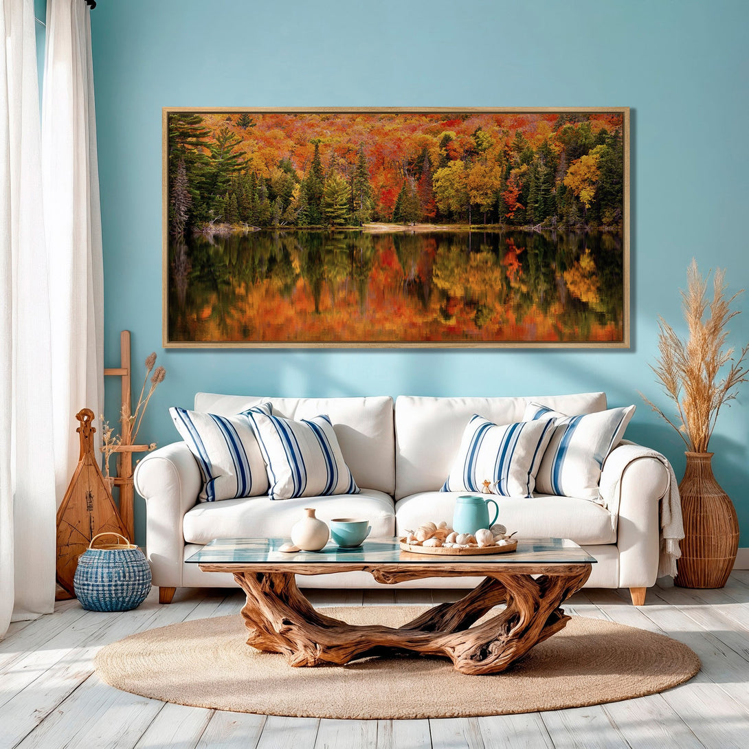 Framed Wall Art: Stunning autumn landscape Canvas Print, featuring vibrant red, orange, and green trees reflected in a lake. Perfect for adding warmth to your home.