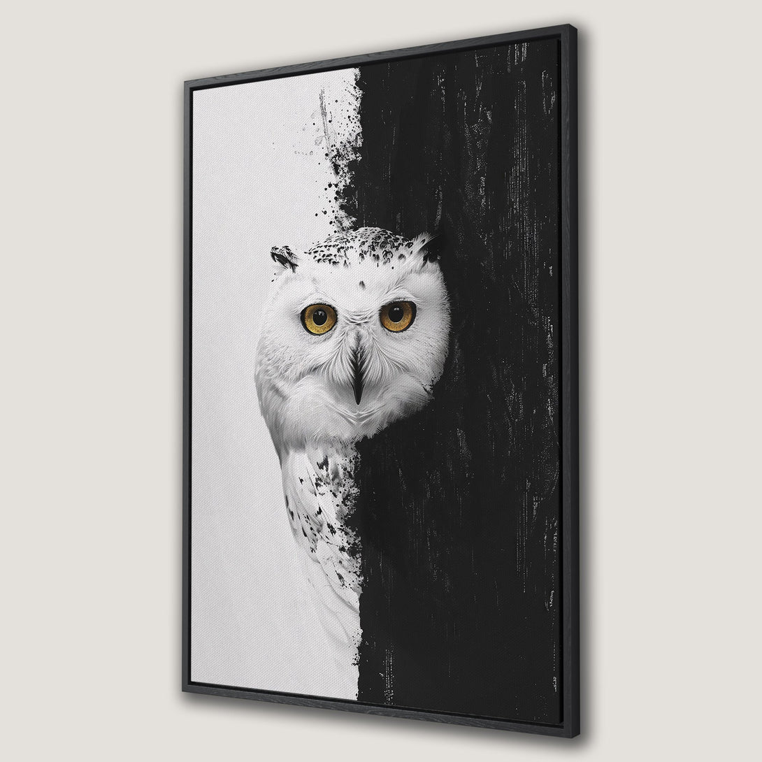 Framed Wall Art featuring a striking owl portrait in a modern, abstract style. The canvas print showcases a dramatic black and white color palette with golden eye details.