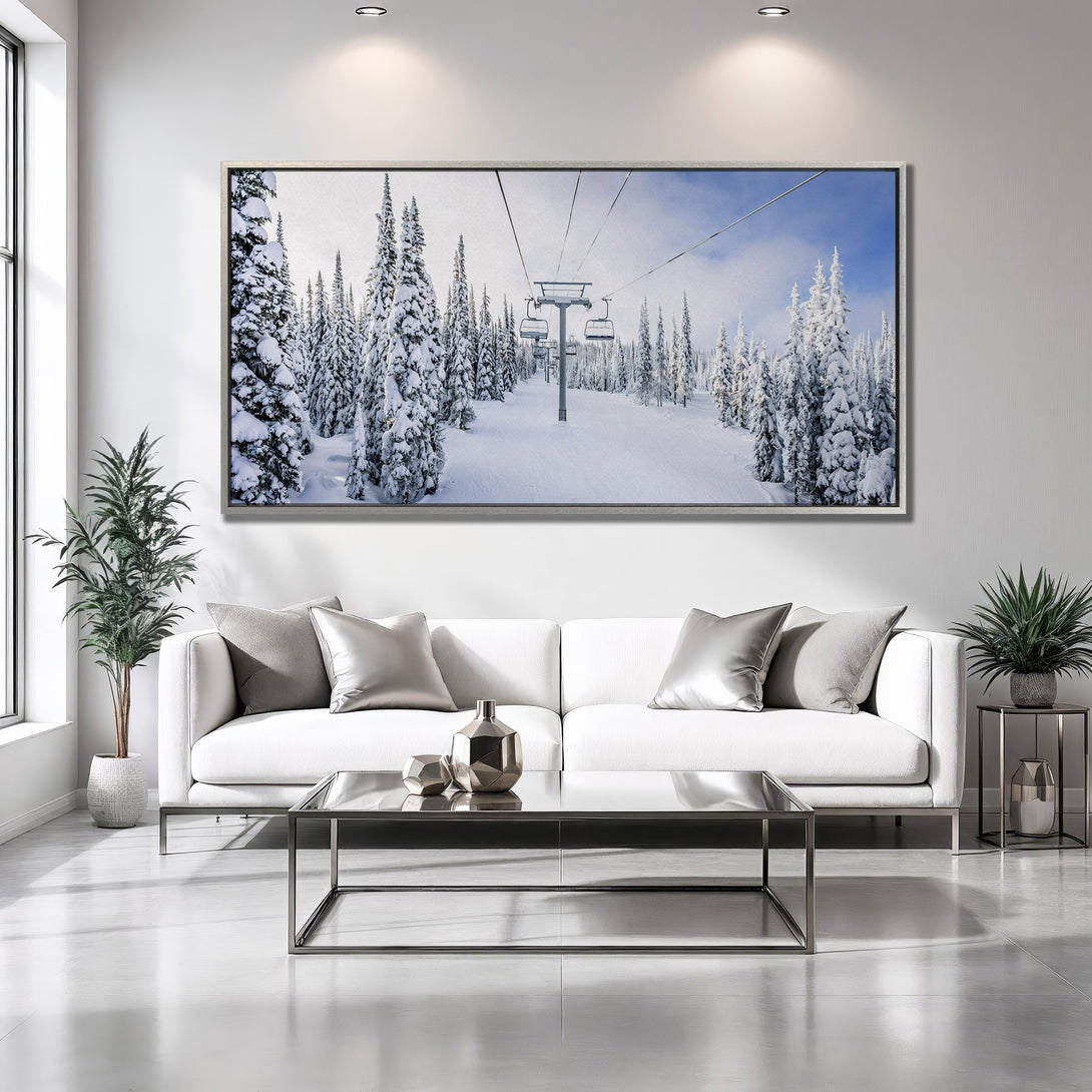 Framed Wall Art: Winter ski resort scene in blue, white, and gray. Snowy trees and ski lift create a serene, modern landscape for your home.