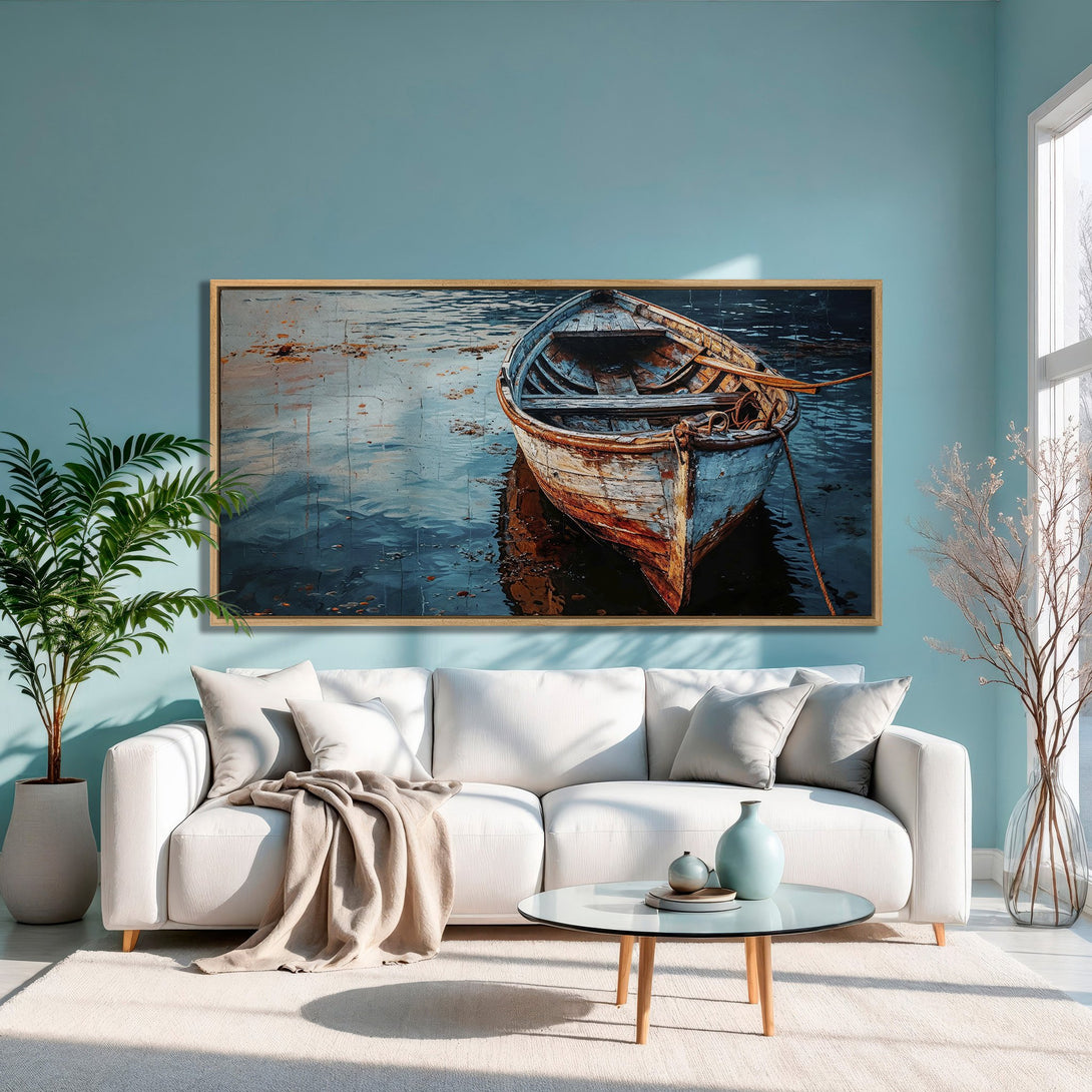 Framed Wall Art featuring a rustic boat on water. Coastal art with a blue and brown color palette, perfect for adding a serene touch to your home.