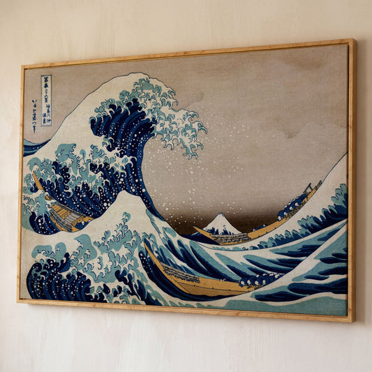 The Great Wave off Kanagawa. Hokusai Canvas Wall Art shown in white oak floating frame