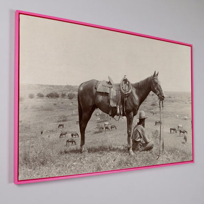 Cowboy Resting by His Horse, Western Field Canvas Wall Art in pink floating frame