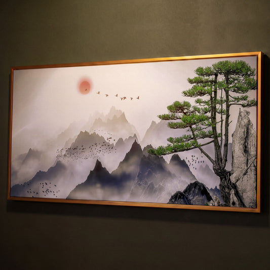 Mountain Sunrise Canvas Art with Birds and Winter Tree shown in antique gold floating frame