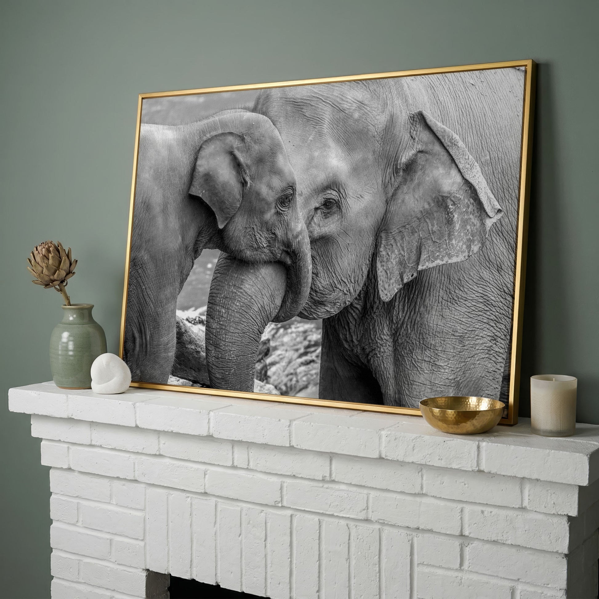 Two Elephants, Trunks Entwined. Canvas Wall Art in yellow gold floating frame