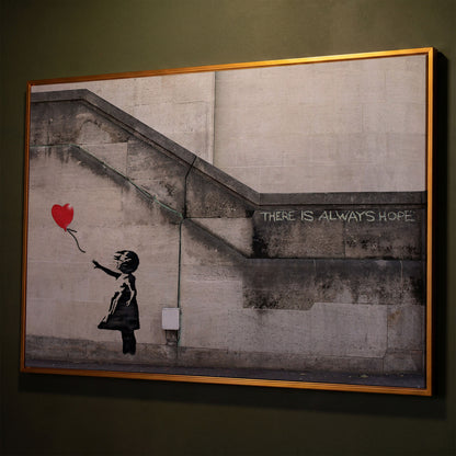 Banksy Balloon Girl Canvas Art, There Is Always Hope Street Art Print shown in antique gold floating frame