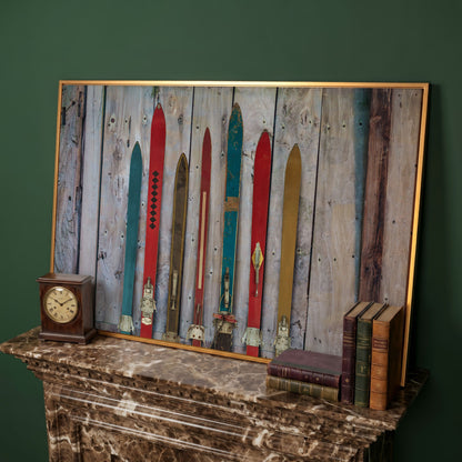Vintage Wooden Skis on Weathered Planks Canvas Wall Art in antique gold floating frame