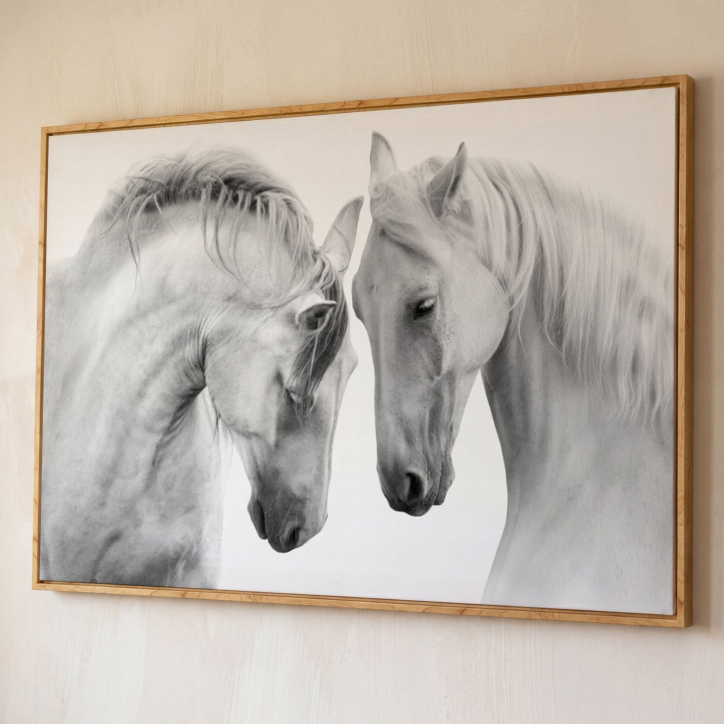 Two Horses Close-Up Portrait Canvas Wall Art shown in white oak floating frame