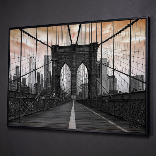 Brooklyn Bridge Canvas Art with NYC Skyline and American Flag shown in black floating frame