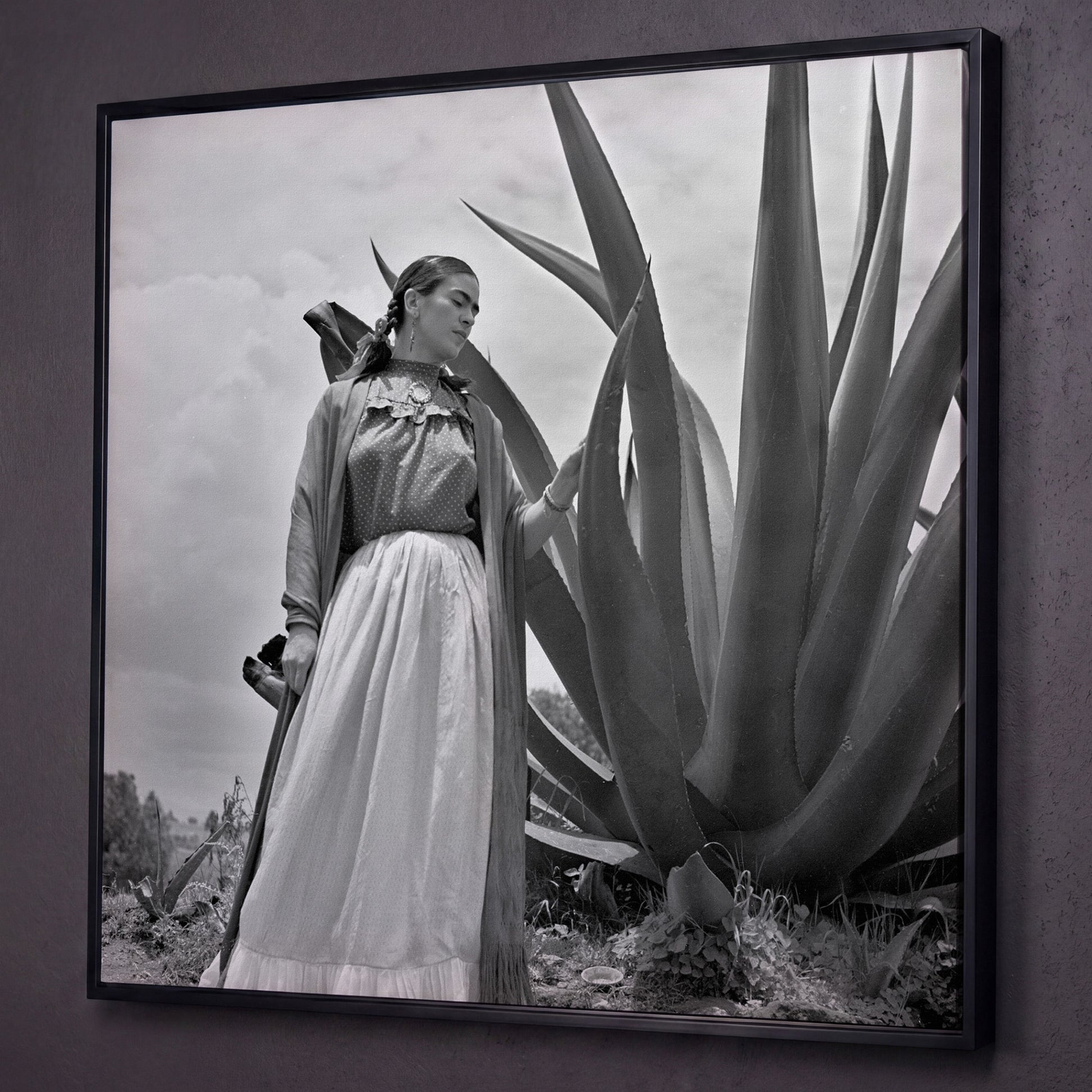 Frida Kahlo Standing Portrait Canvas Wall Art shown in black floating frame