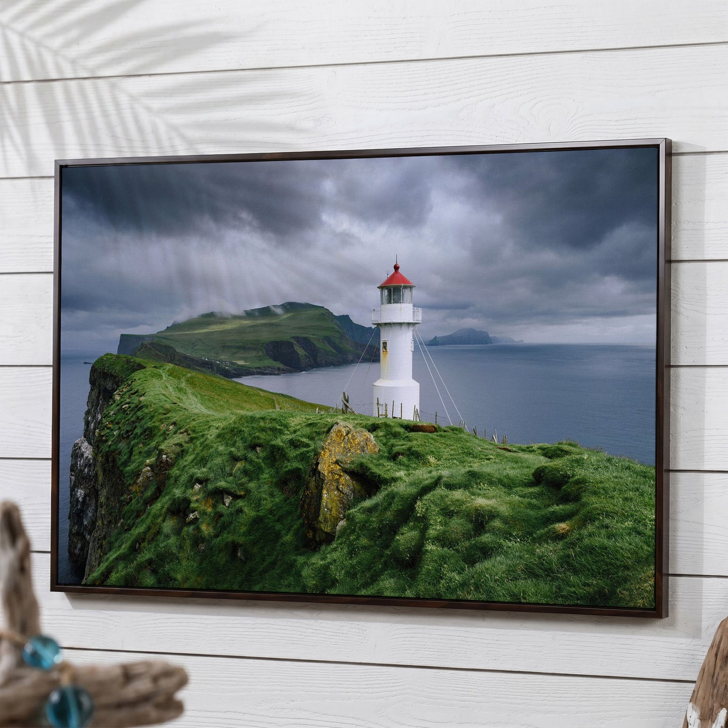 White Lighthouse on a Stormy Cliff, Coastal Canvas Wall Art in dark walnut floating frame