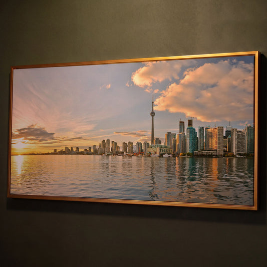 Toronto Skyline at Sunset Canvas, CN Tower Panoramic Wall Art shown in antique gold floating frame