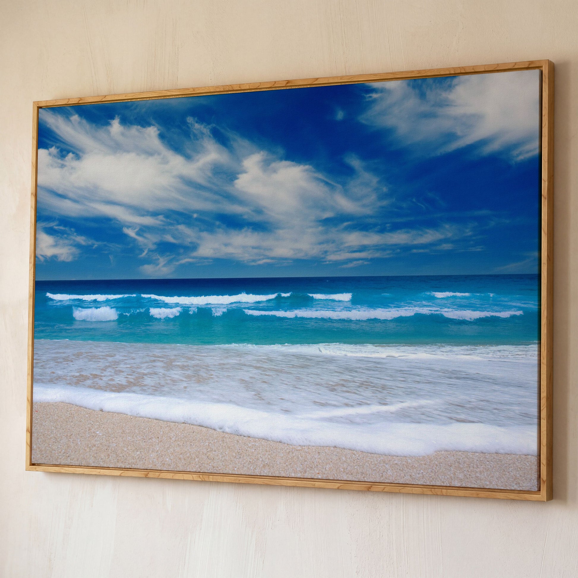 Moody Ocean Waves Seascape Canvas Art, Beach and Sky shown in white oak floating frame