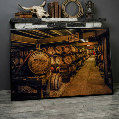 Laphroaig Distillery Barrel Rows Canvas Wall Art in black floating frame