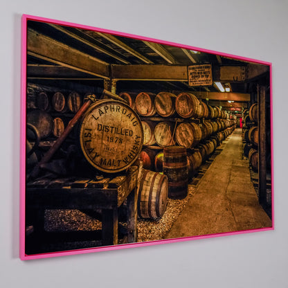Laphroaig Distillery Barrel Rows Canvas Wall Art in pink floating frame