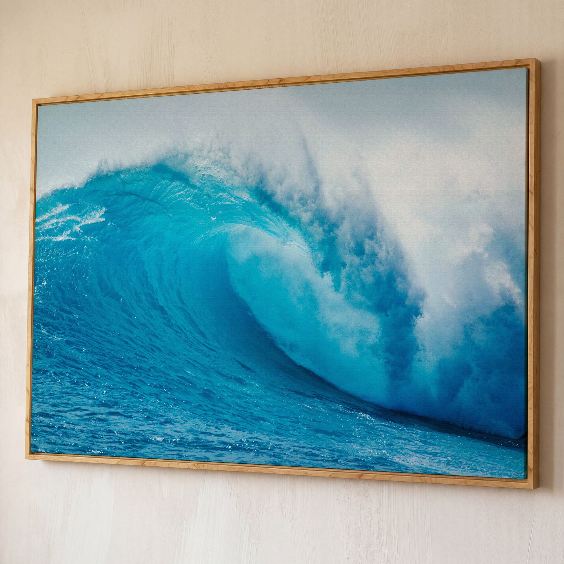 Ocean Wave Canvas Wall Art | Moody Seascape Print shown in white oak floating frame