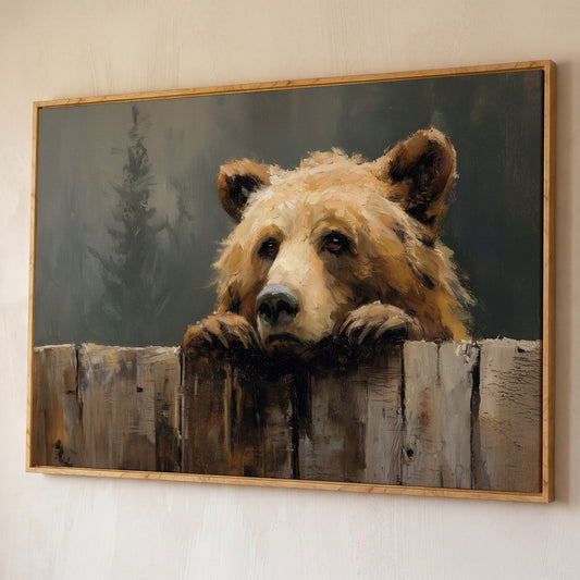 Brown Bear Peeking Over a Fence. Canvas Wall Art shown in white oak floating frame