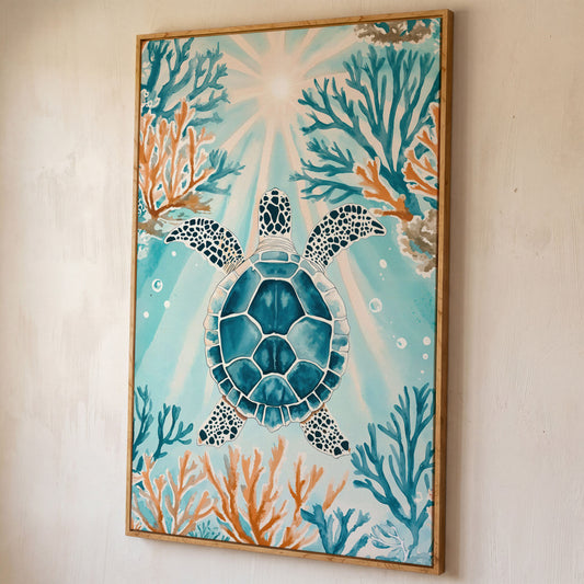 Sea Turtle and Coral Reef Ocean Canvas Wall Art shown in white oak floating frame