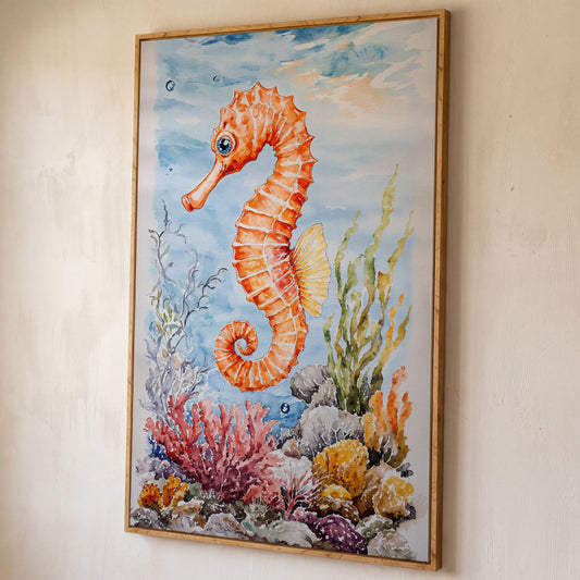 Watercolor Seahorse Canvas Art, Coral Reef Ocean Print shown in white oak floating frame